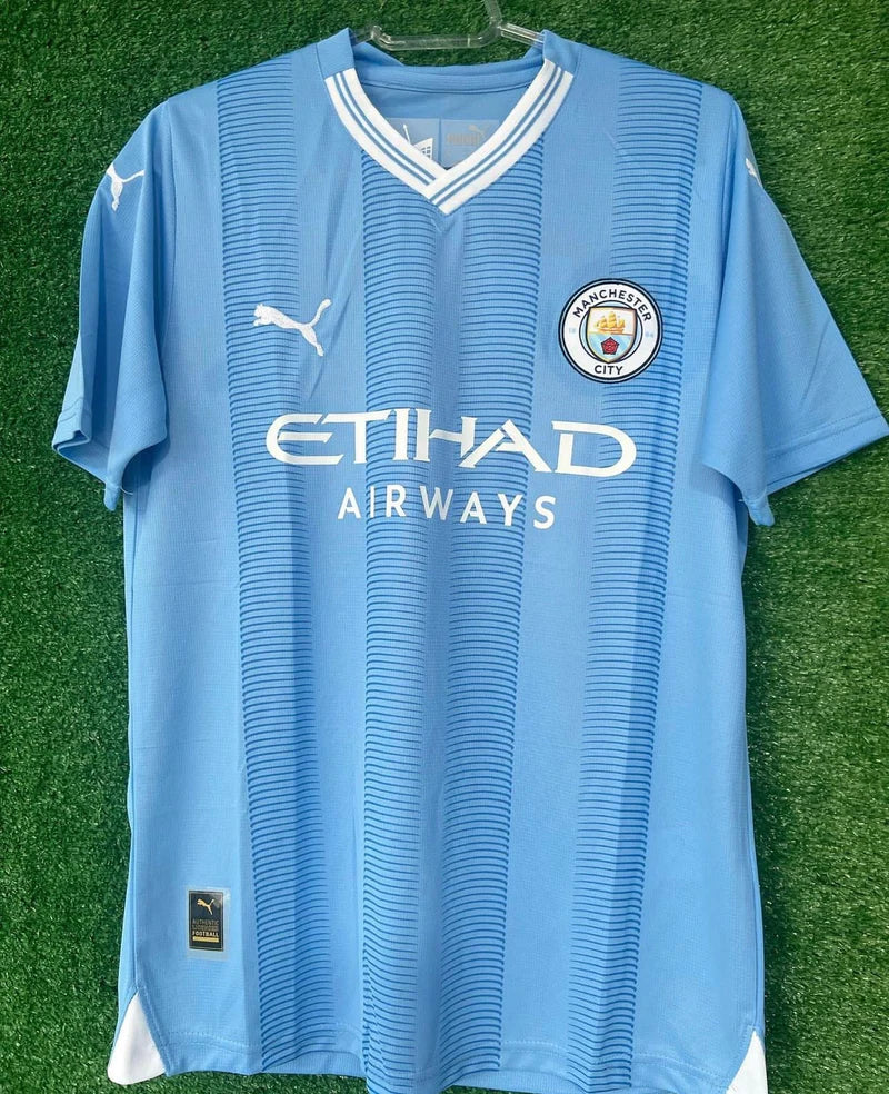 Jersey Manchester City I com PATCH 23/24 - Blue and White